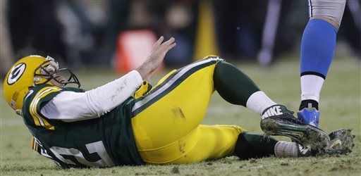 Aaron Rodgers overcomes calf injury, leads Packers to NFC championship game  – New York Daily News