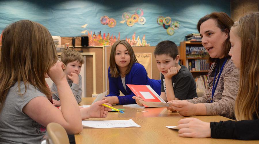 Students share writing with community