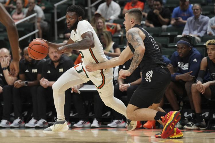 No. 12 Miami rallies from 2ndhalf deficit, holds off FIU