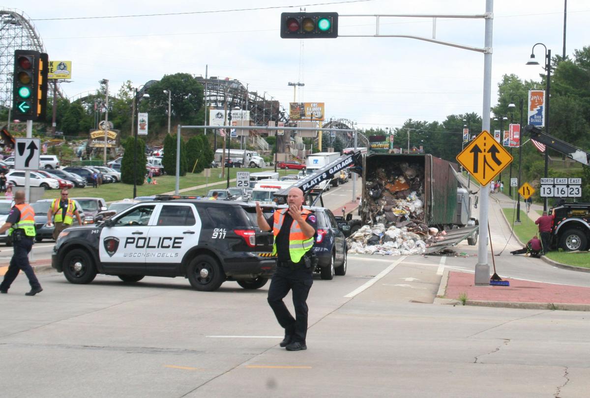 Traffic backed up as truck overturns in Lower Dells at Highway 13