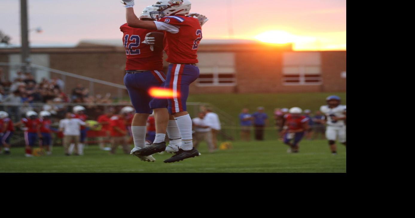 After decades of trying to beat each other, rival high school football teams join forces
