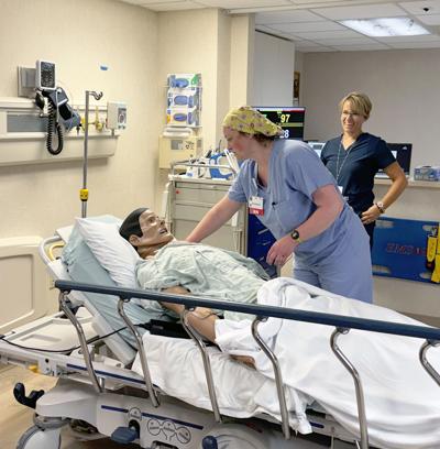 Mile Bluff Registered Nurse, Stephanie Vest, and clinical nurse educator, Kelly McCann, use Mile Buff Medical Center’s new simulation manikin in the organization’s Simulation Learning Lab. This advanced training technology allows healthcare professionals to practice clinical skills, strengthen critical thinking, and respond to realistic patient care scenarios in safe, hands-on learning environment.
