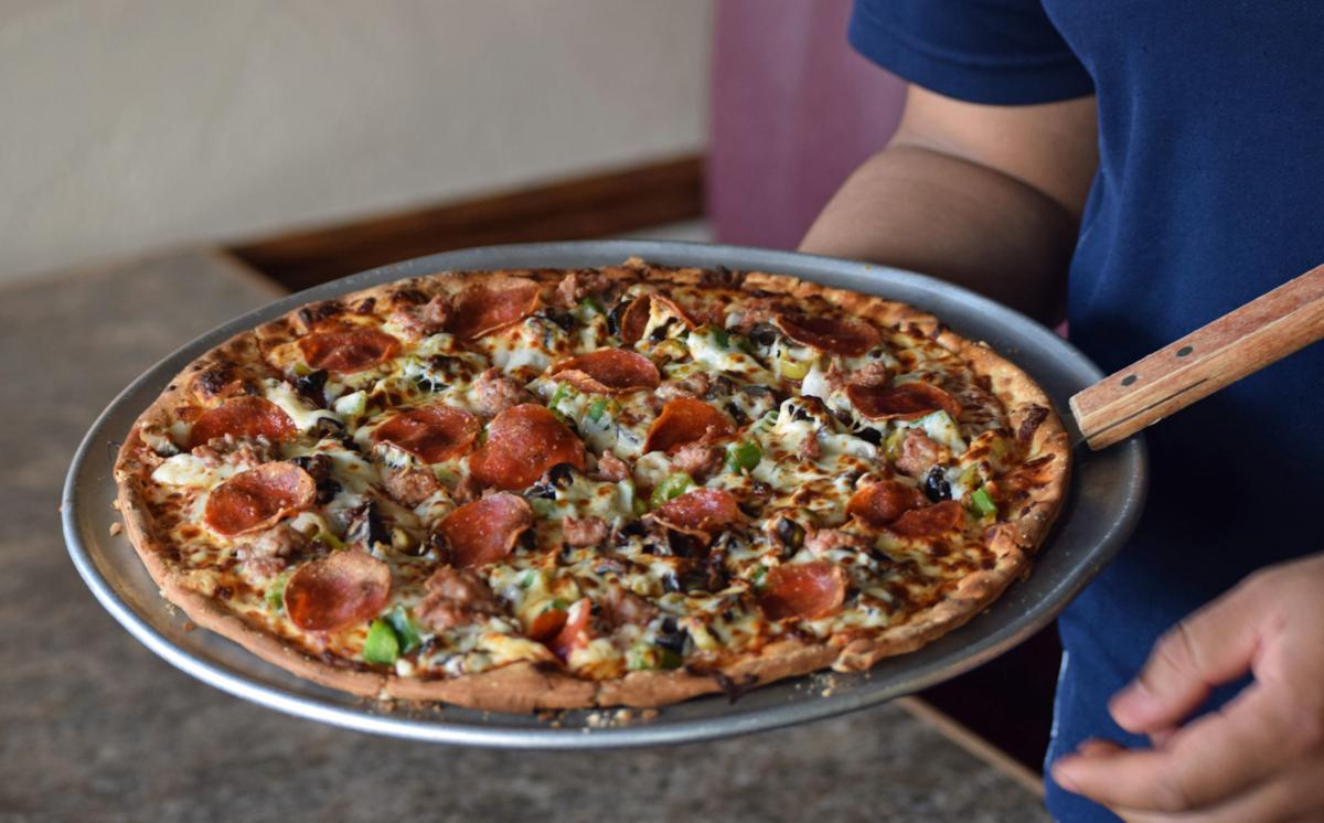 Signature Fare Dells staple Pizza Villa provides accessible, classic