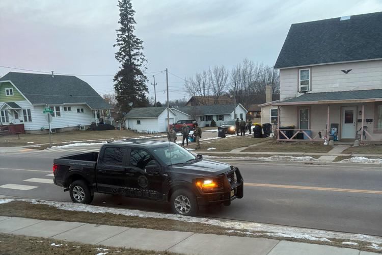Authorities outside New Lisbon home
