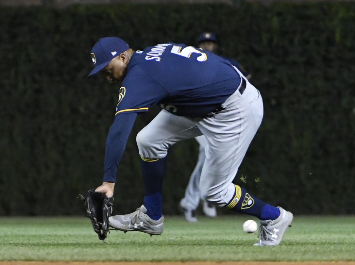 CHICAGO, IL - JUNE 16: Ryan Braun #8 of the Milwaukee Brewers runs against  the Chicago Cubs
