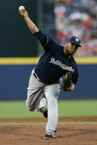 Peralta will begin season in Brewers' starting rotation