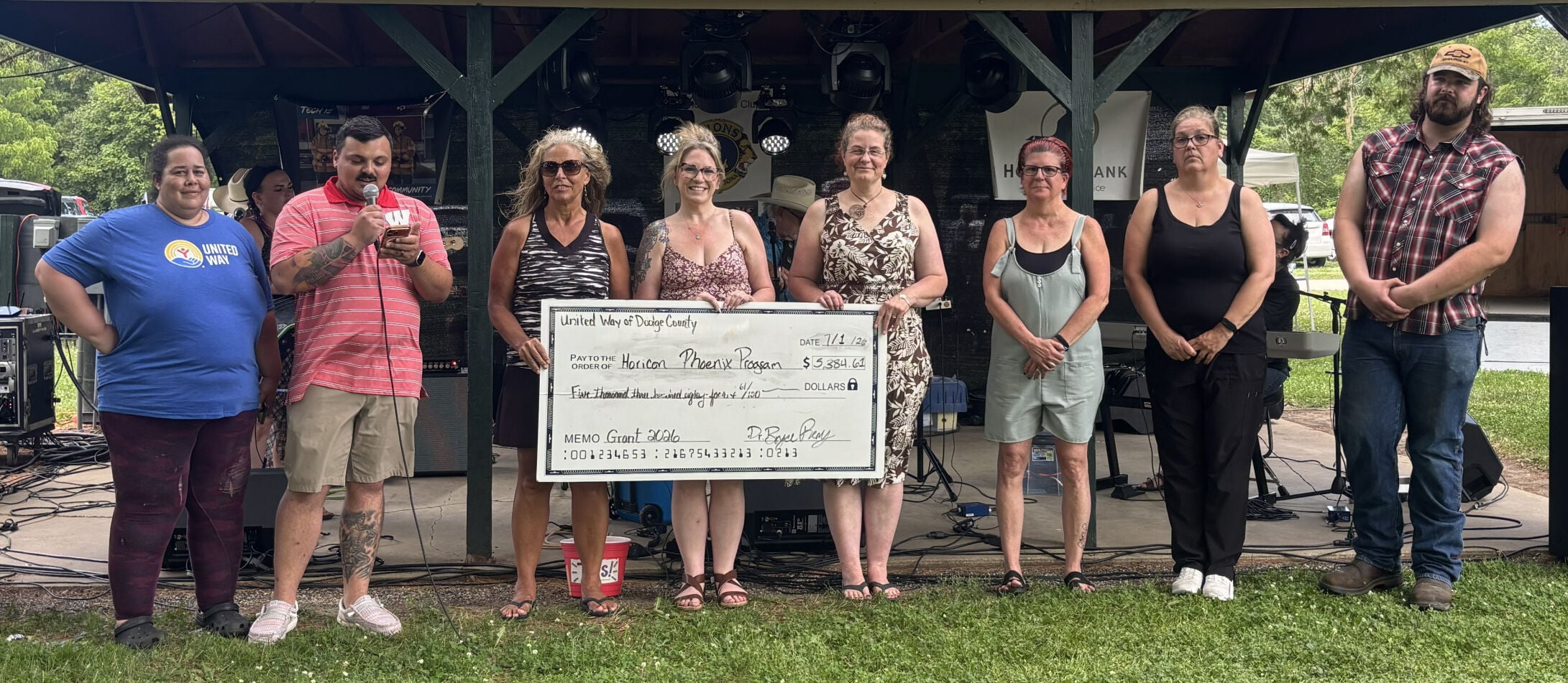 United Way of Dodge County representatives, from left, Tricia Bradley, Bryce Remy, Tammy Appel, presents a $5,000 donation to Horicon Phoenix representatives, Christine Schmitz, Lahnie Neu, Jenni Dettmann, Jenny Rabehl, Lahn Neu, according to a July 7 release.