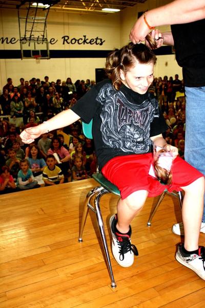 New Lisbon Elementary School hair-cutting