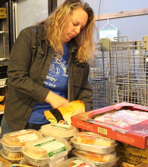 Shannon organizes food (copy)