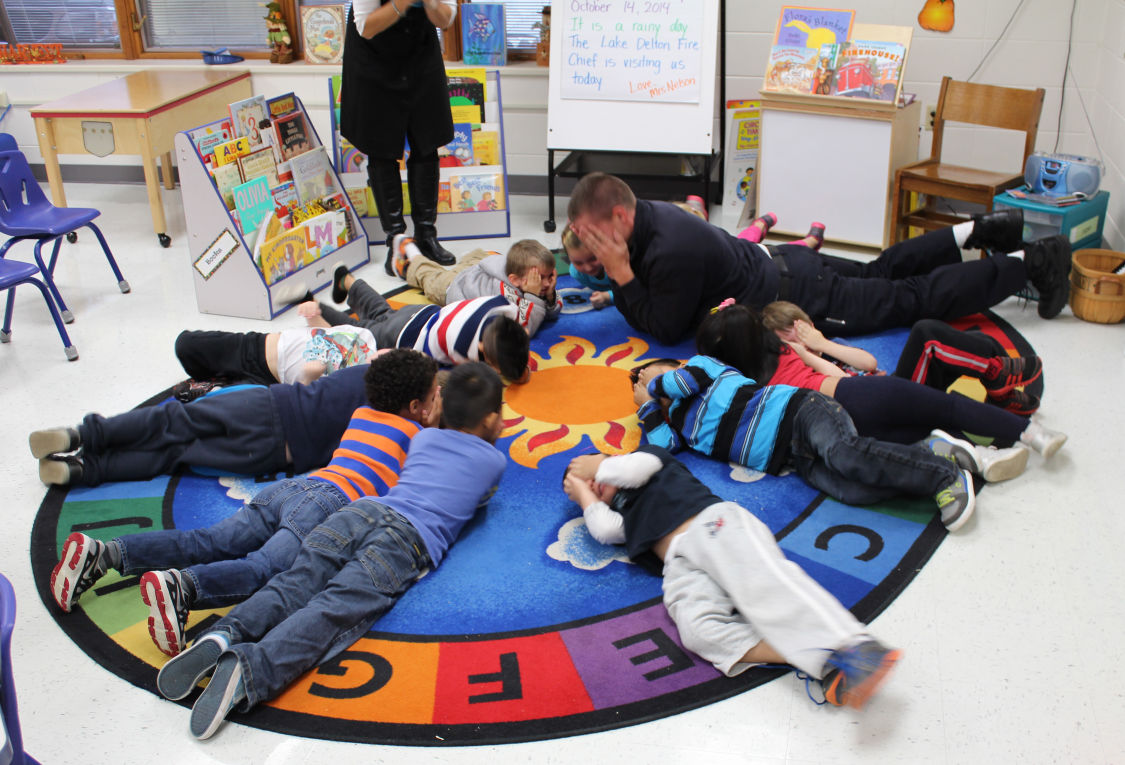 Children learn to stop, drop and roll