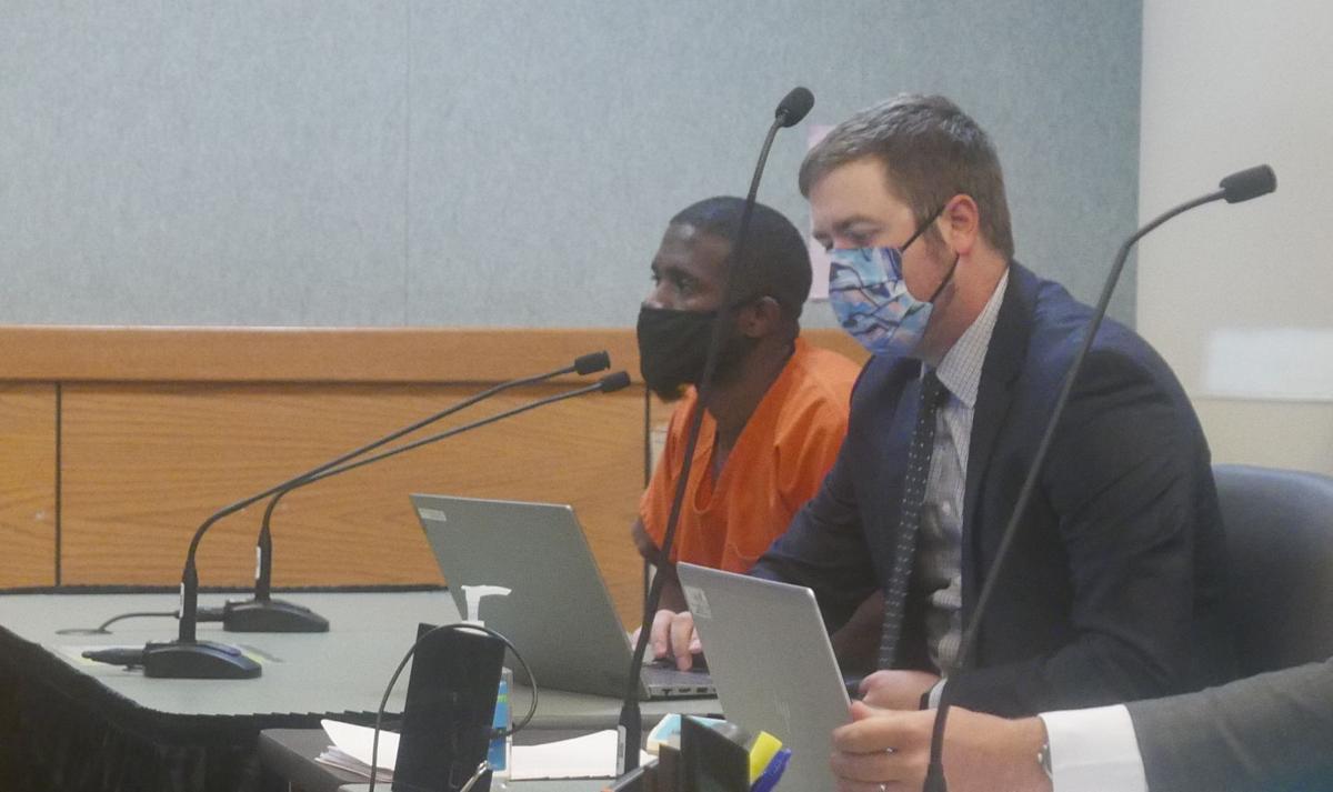 Tamir Williams with Gregory Holdahl of the State Public Defender's Office.