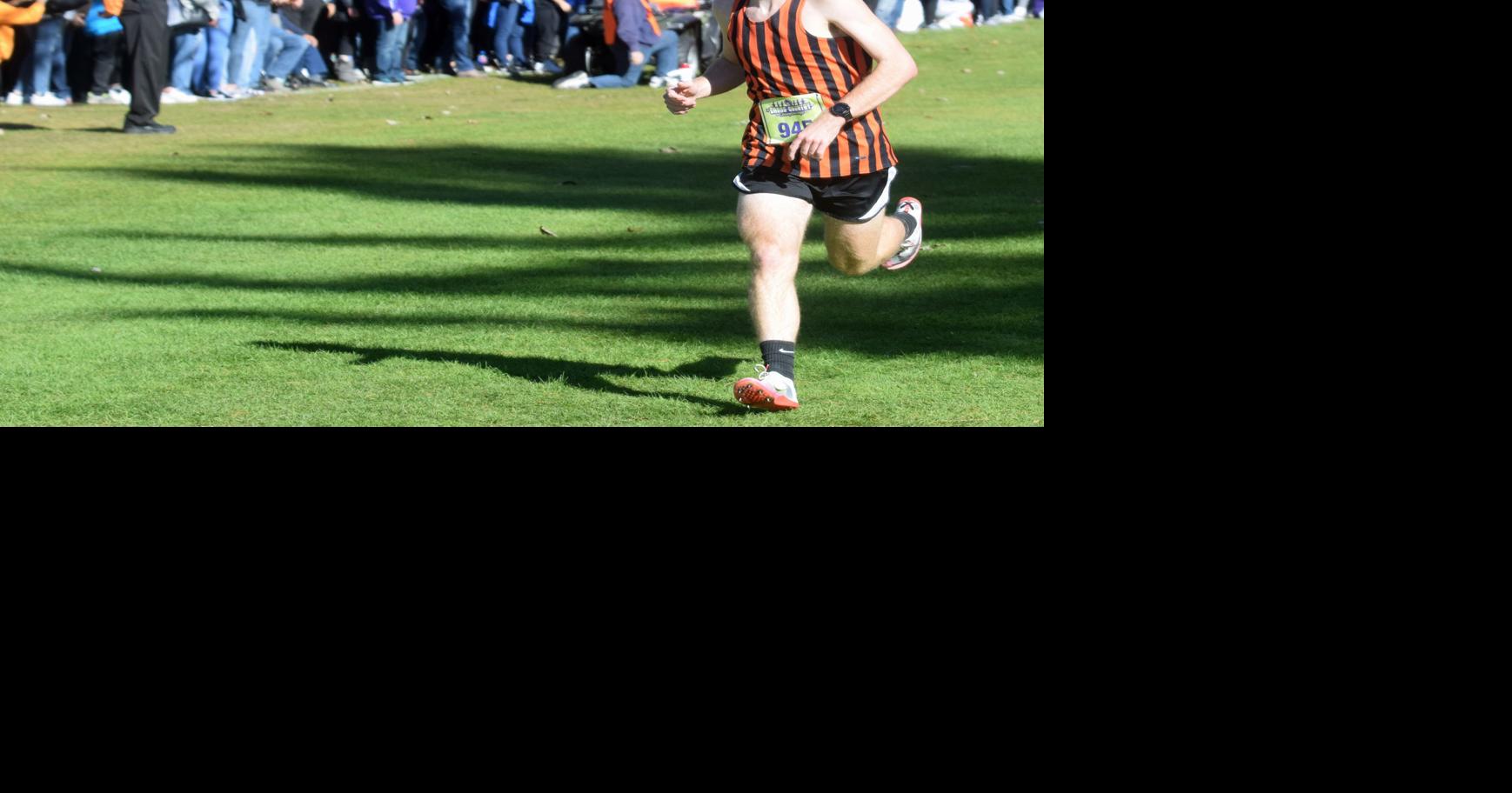 Tucker Johnson takes seventh, powers boys to fourthplace