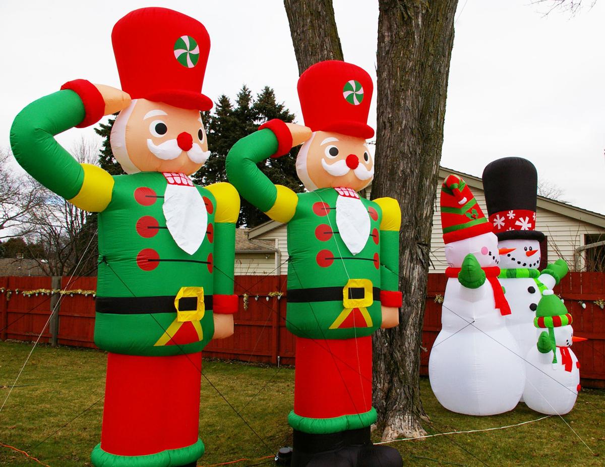 Holiday Blow Up Inflatable Decorations A Christmastime Hit Regional News Wiscnews Com