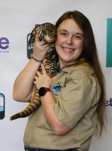 Megan Anderson, education specialist at J&R Aquatic Animal Rescue, with Sweet Pea.