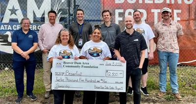 Representatives from Meta’s Beaver Dam Data Center, Beaver Dam Area Community Foundation and the BeaverFest Committee celebrate a combined $12,500 contribution supporting BeaverFest 2026. From front, left, Kim Schoenberger, Patty Sanchez-Walker, Rick Smith; back row, Tom Heffron, Mike Gleeson, Brian Horras, Michael Rossing, Kyle Frake, Dillon Sehmer.