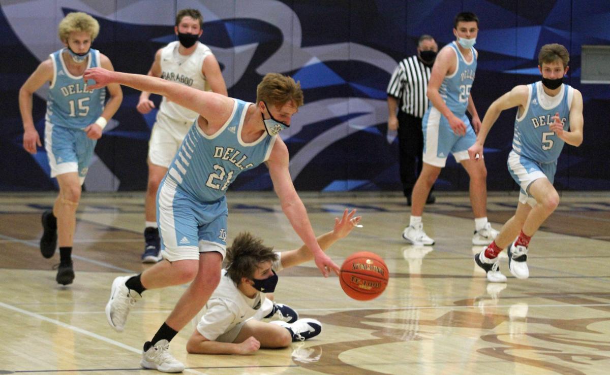 PREP BOYS BASKETBALL Wisconsin Dells stays unbeaten with 6738 road