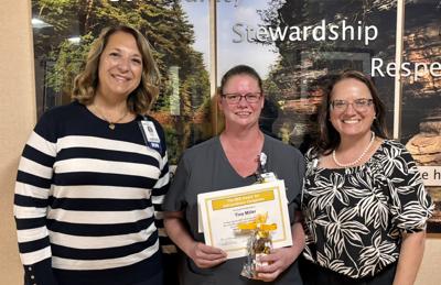 Tina Miller, center, an SSM Health St. Clare Hospital - Baraboo certified nurse assistant, has been named the newest recipient of the BEE - Be Exceptional Everyday – Award on June 30, with Mary LeHam, left, and Dyana Tillinger.