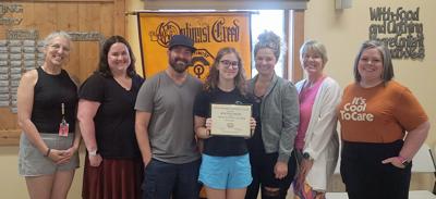 From left, Heather Curtis, Sauk Prairie Middle School; Tricia Rodey, SPMS principal; Nate, Ryette, and Krystal Smith; grandmother, Sheila Campbell; and Mega Tarnutzer, SPMS on June 3.