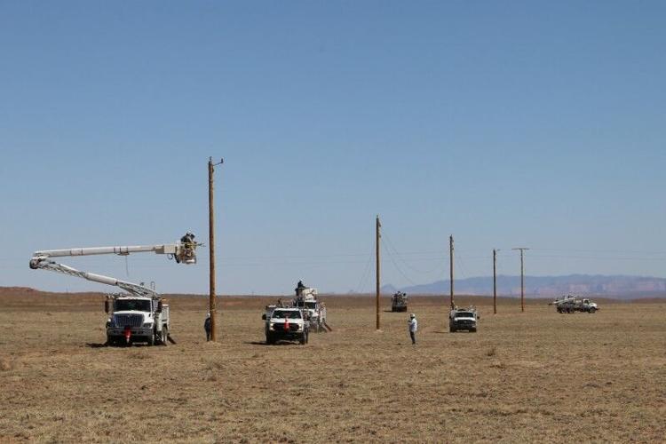 2022 SRP Crews Set Miles of Poles During Week One During Light Up Navajo Project.jpg