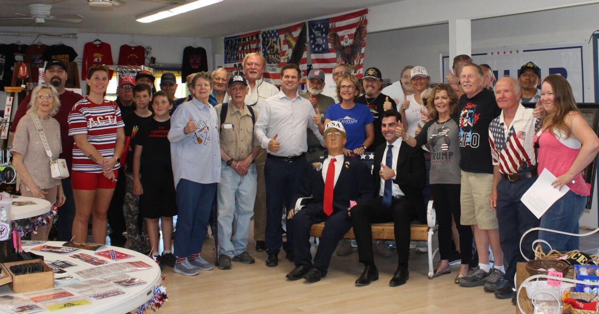 Group photo with Trump doll