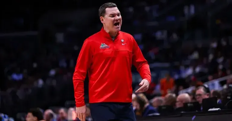 Arizona’s Tommy Lloyd leads pushback as Big 12 weighs 20‑game basketball schedule