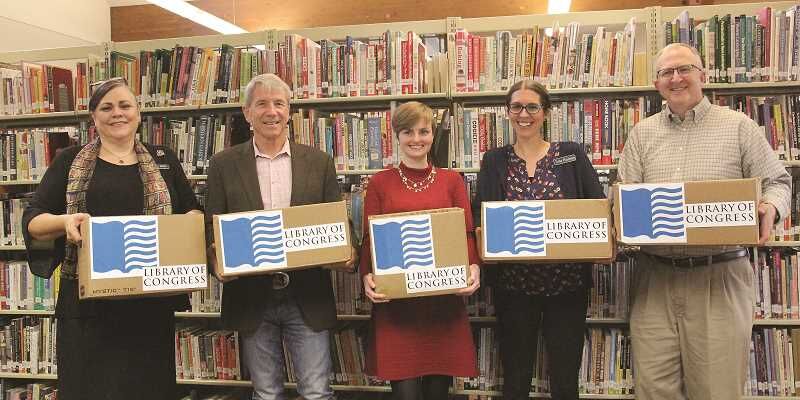 Rep. Schrader brings Library of Congress books to Mount Angel