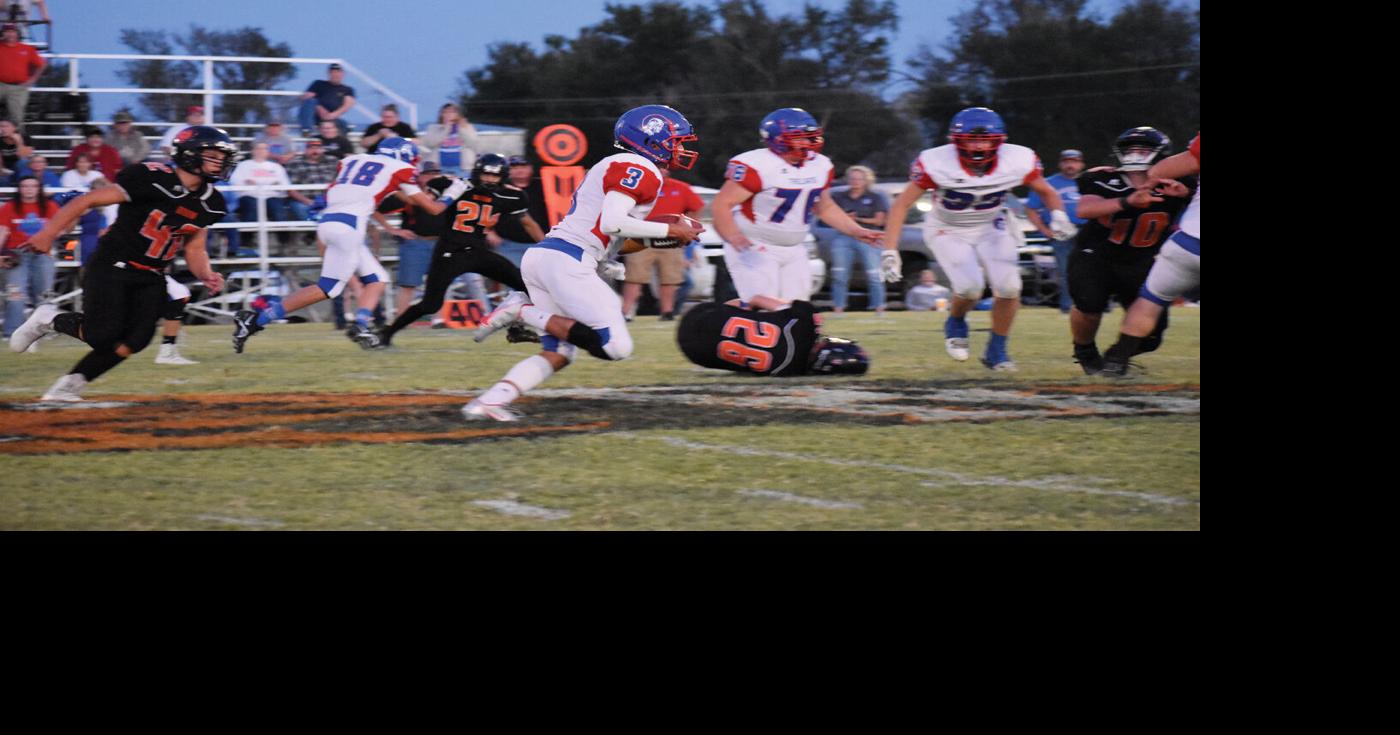 Area football roundup Boomers, Trojans pick up district victories Local News