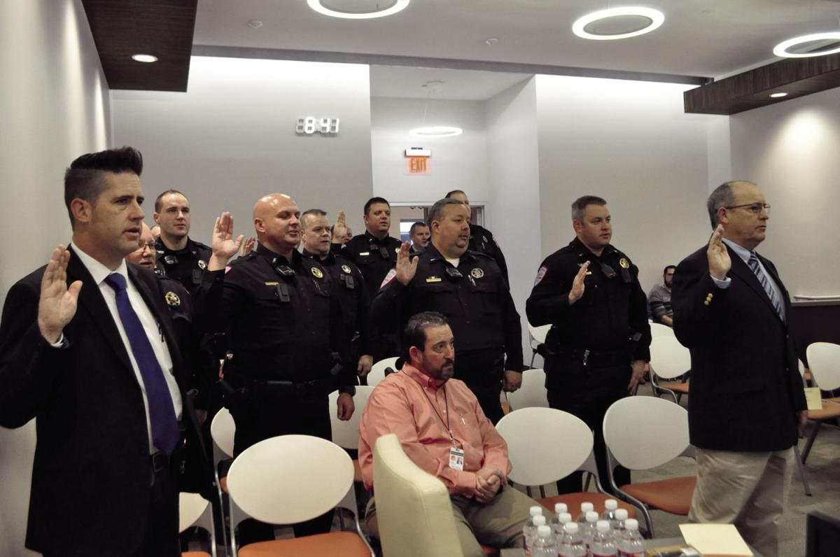 Woodward police induct new officer News