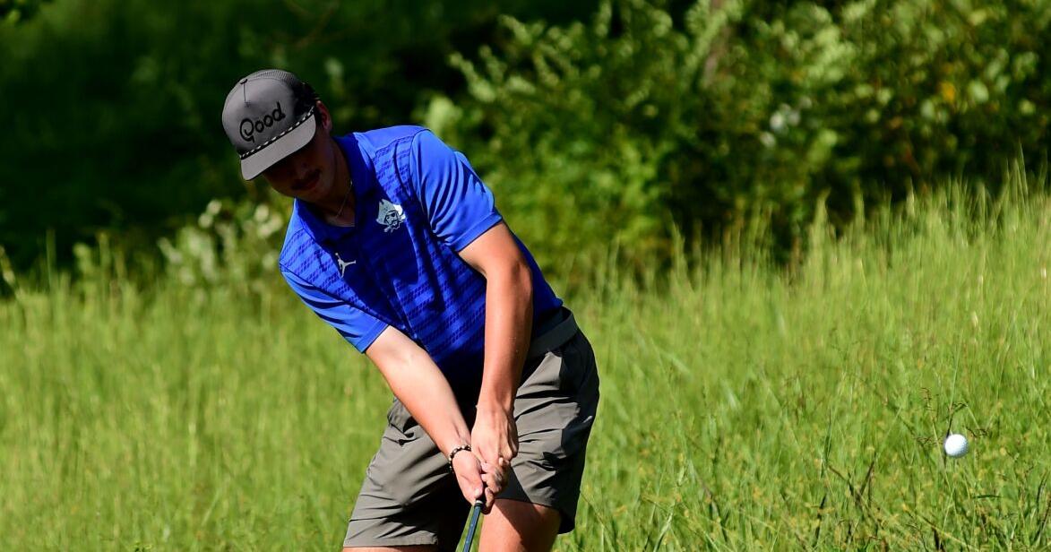 fisher pitching out of the rough.JPG