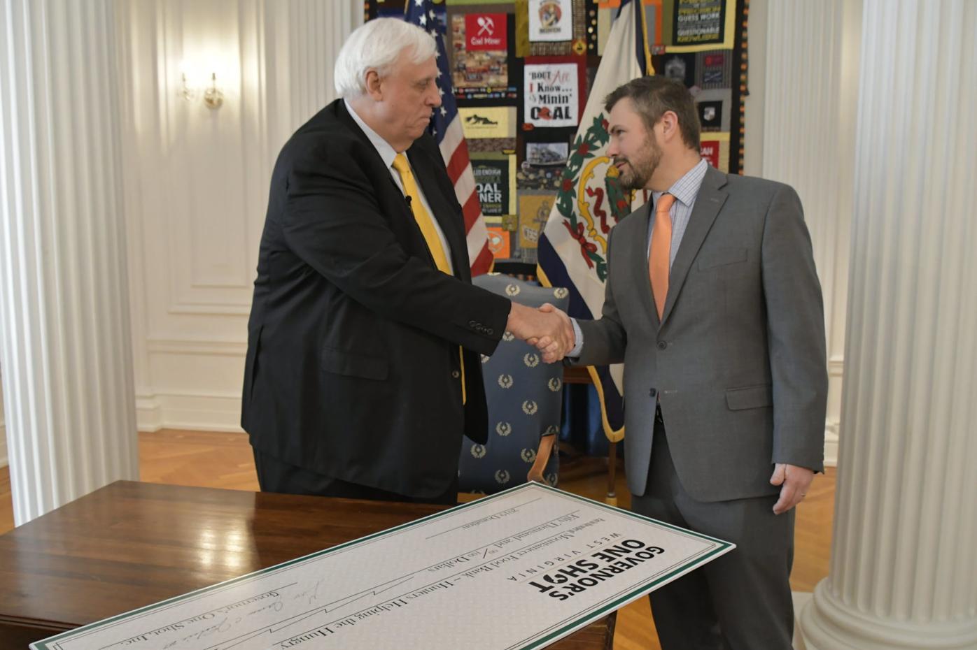 WV Gov. Justice presents $50k to Mountaineer Food Bank ...