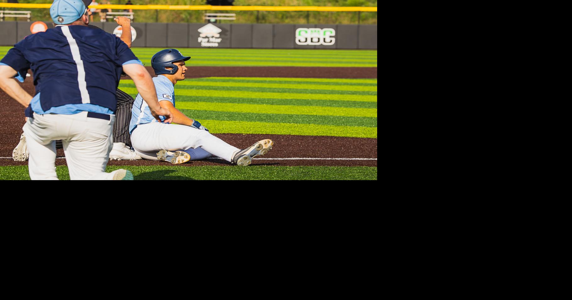 7807-10 beats the throw to third for a triple.jpg