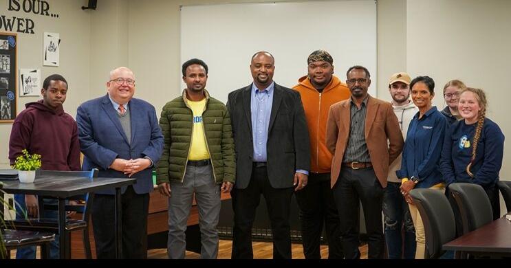 Ethiopian Visitors with Students in Gathering Place.jpg
