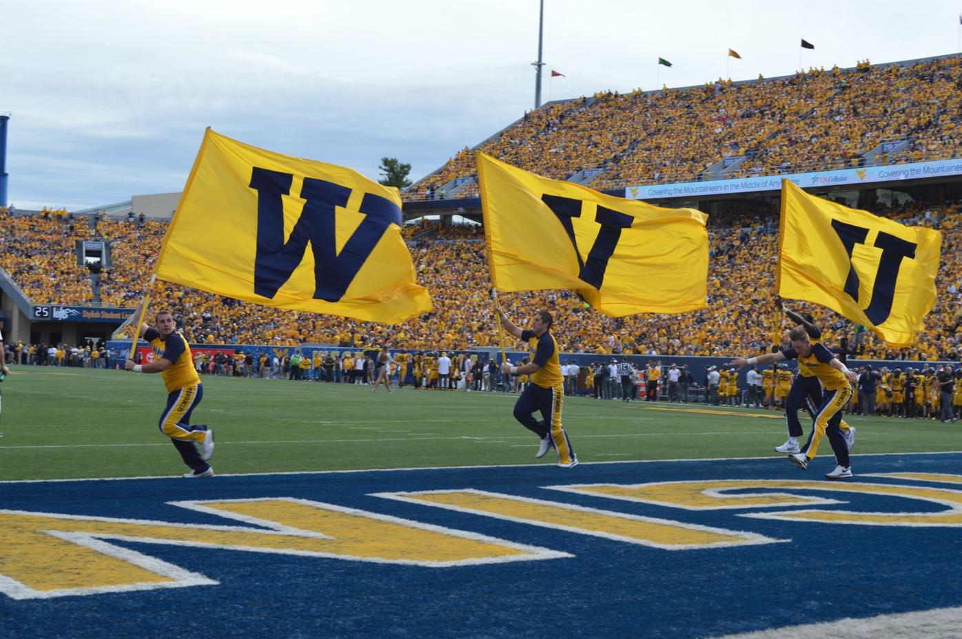 WVU cheerleaders bring pep, spirit to Mountaineer Field ...