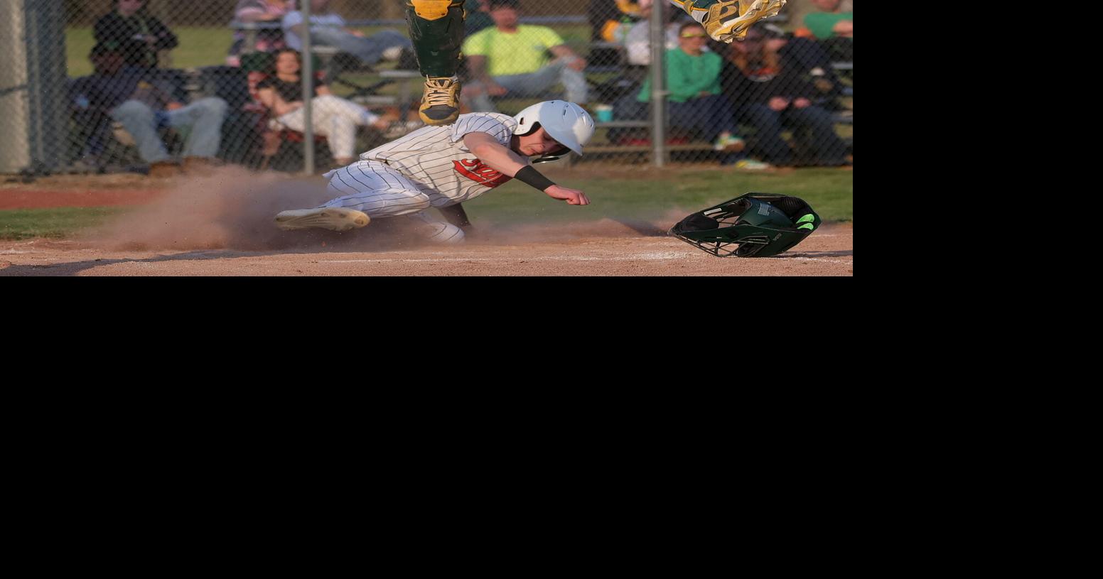 DC Catcher goes airborne while SH #1 scores.JPG