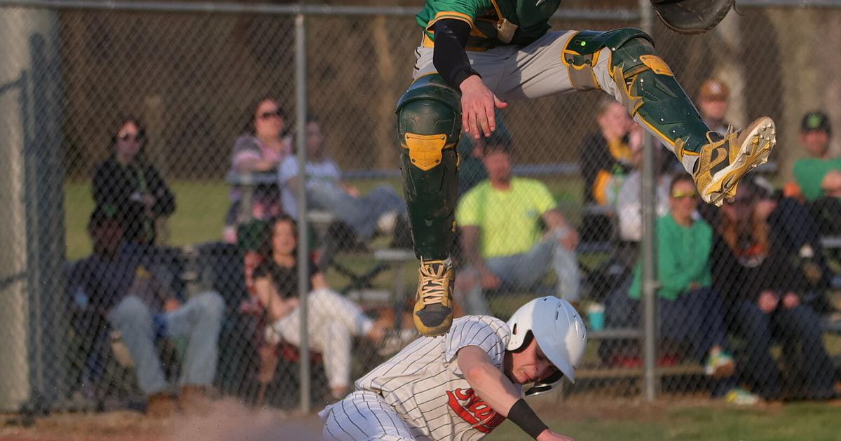DC Catcher goes airborne while SH #1 scores.JPG
