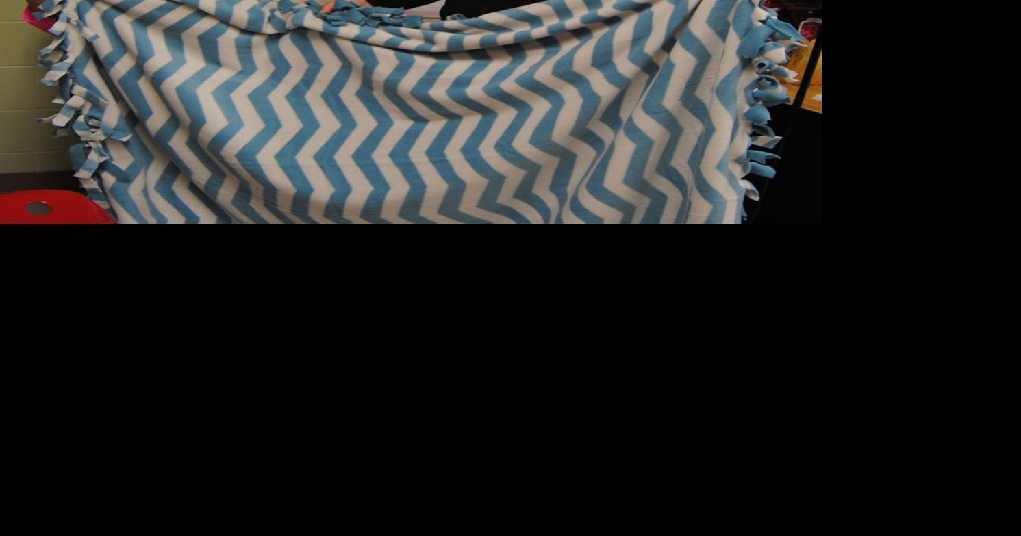 Groups gather to make blankets for Clarksburg Mission Local News for