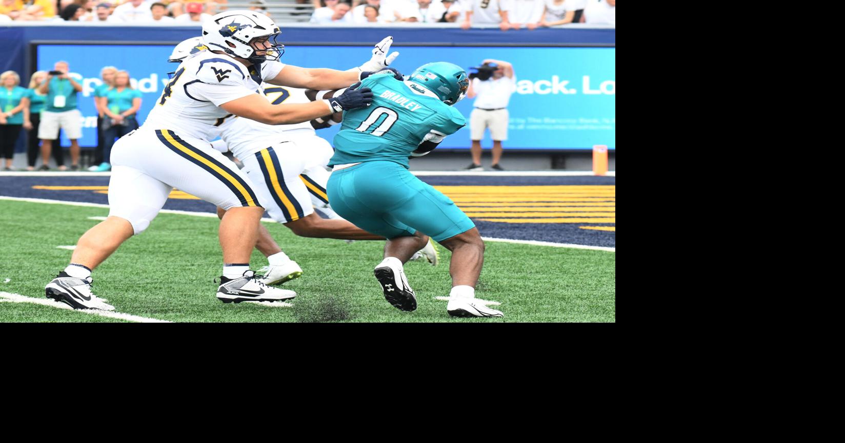 WVU football 0905 Kevin Brown block front