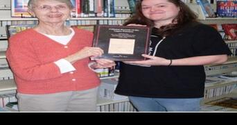 Historical Society donates book to Keyser Library - Vimarsana News