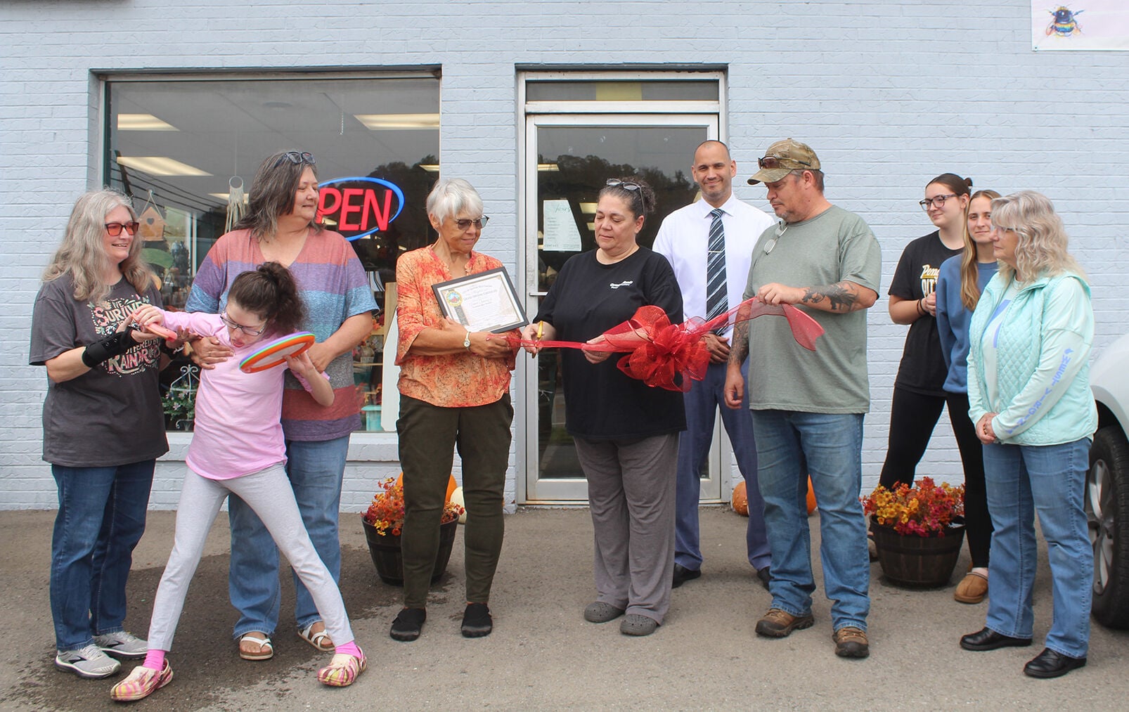 Facebook Ban Ribbons Twisted Bee ribbon cutting.jpg | | wvnews.com
