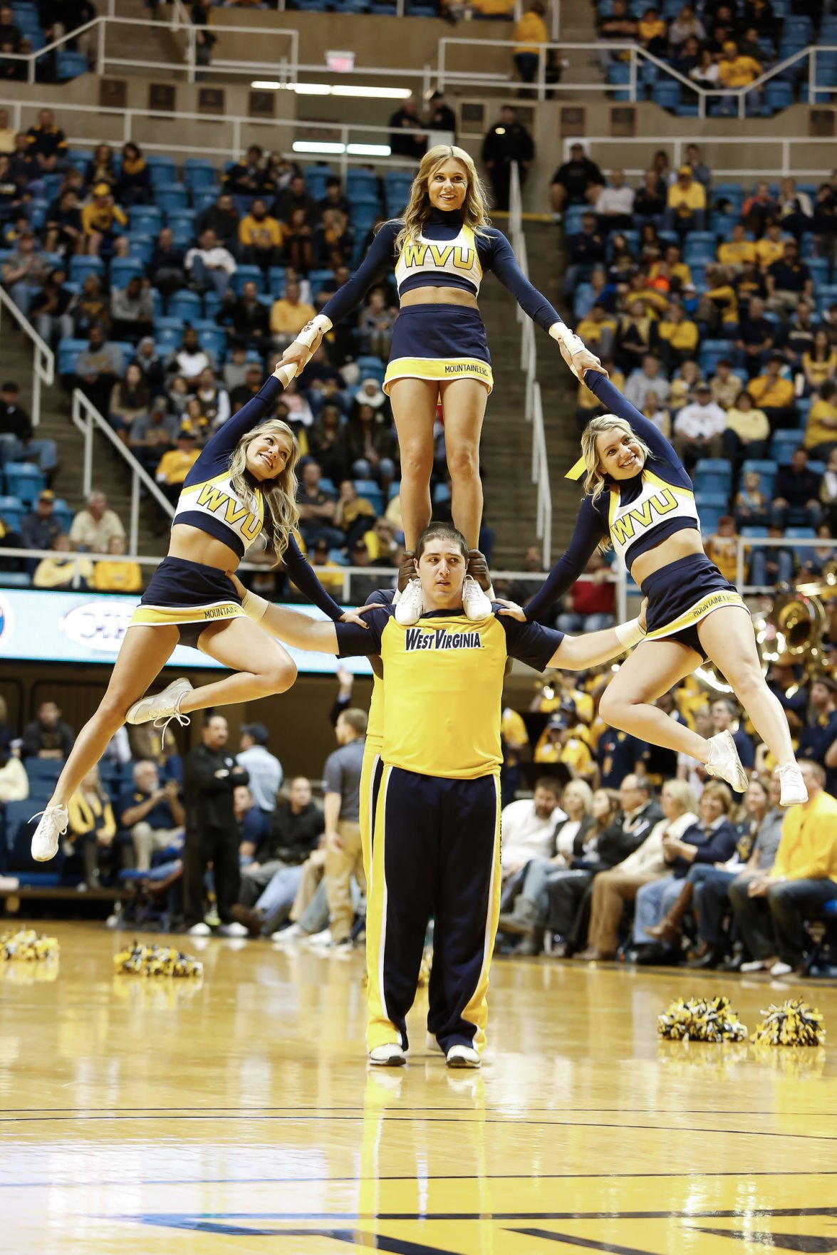 WVU cheerleaders bring pep, spirit to Mountaineer Field | NCWV Life ...