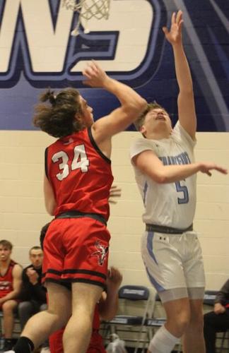 Cam Layton goes to the basket for two of his 16 points against Petersburg.