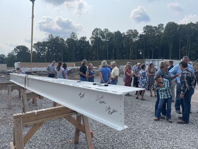 Mountaintop Beverage plant hosts topping off ceremony in