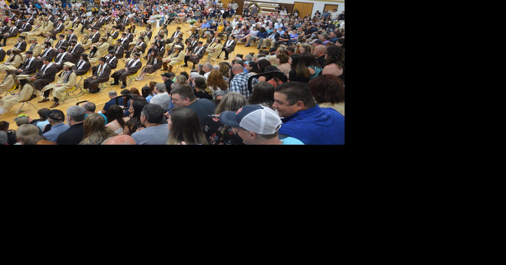 Brown and gold caps and gowns fill Lincoln High School graduation in