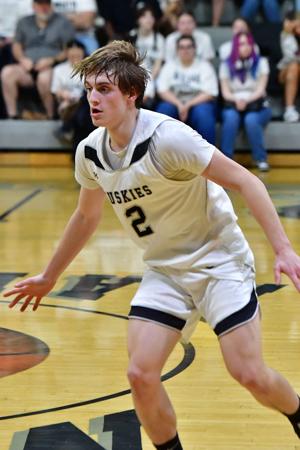 North Marion advances to state tournament with 72-44 victory over John Marshall