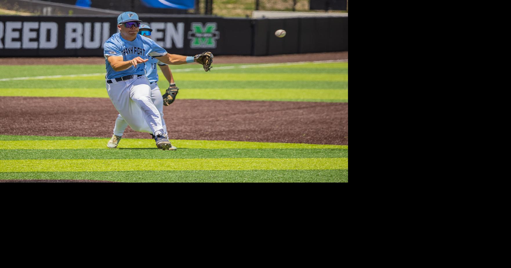 9183-Jacobs throws runner out at first on leaping throw.jpg