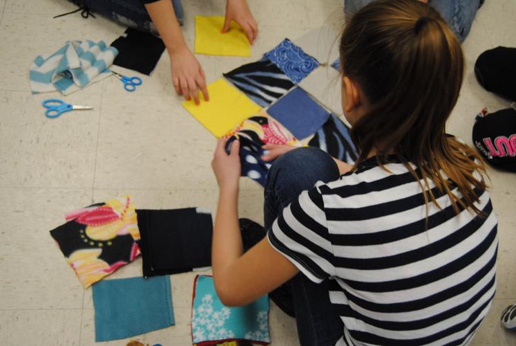 Groups gather to make blankets for Clarksburg Mission Local News for Harrison County