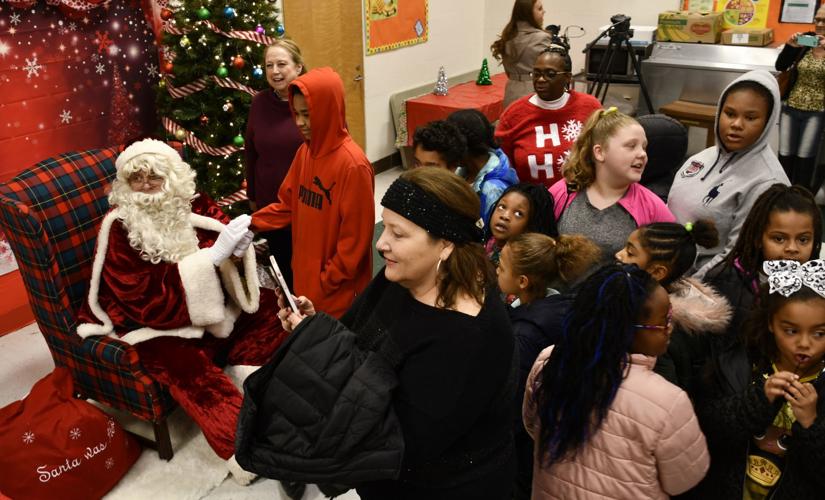 Gov. Justice dresses as Santa Claus, visits Kanawha County, WV, children |  WV News | wvnews.com