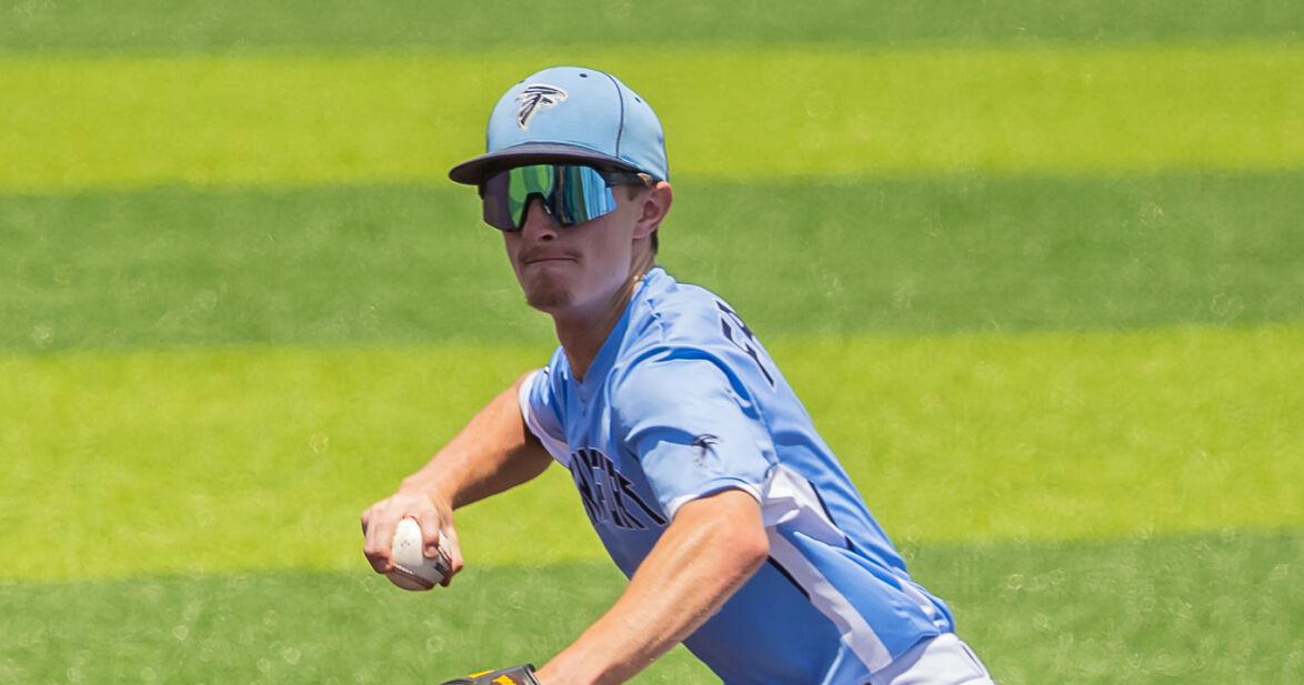 9213-1 throws runner out at first to close out the inning.jpg
