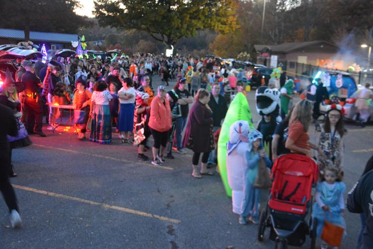 Costumed characters at Clarksburg (West Virginia) trunk or treat