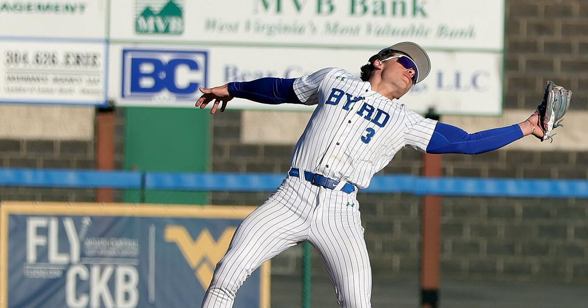 RCB #3 fights the sun to make the 3rd out.JPG